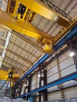 Industrial loading and work equipment inside a warehouse